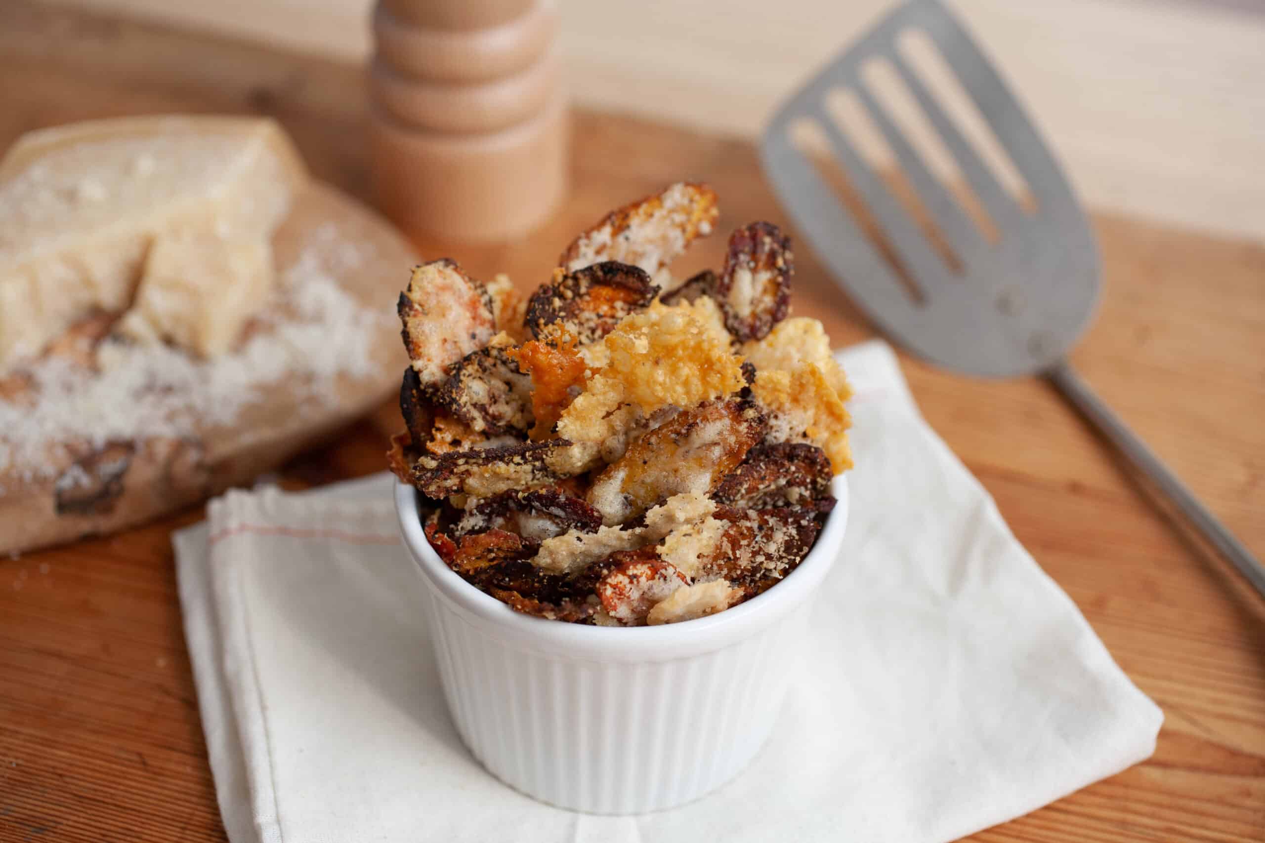 Black Pepper and Parmesan-Crusted Carrot Chips - Grimmway Farms