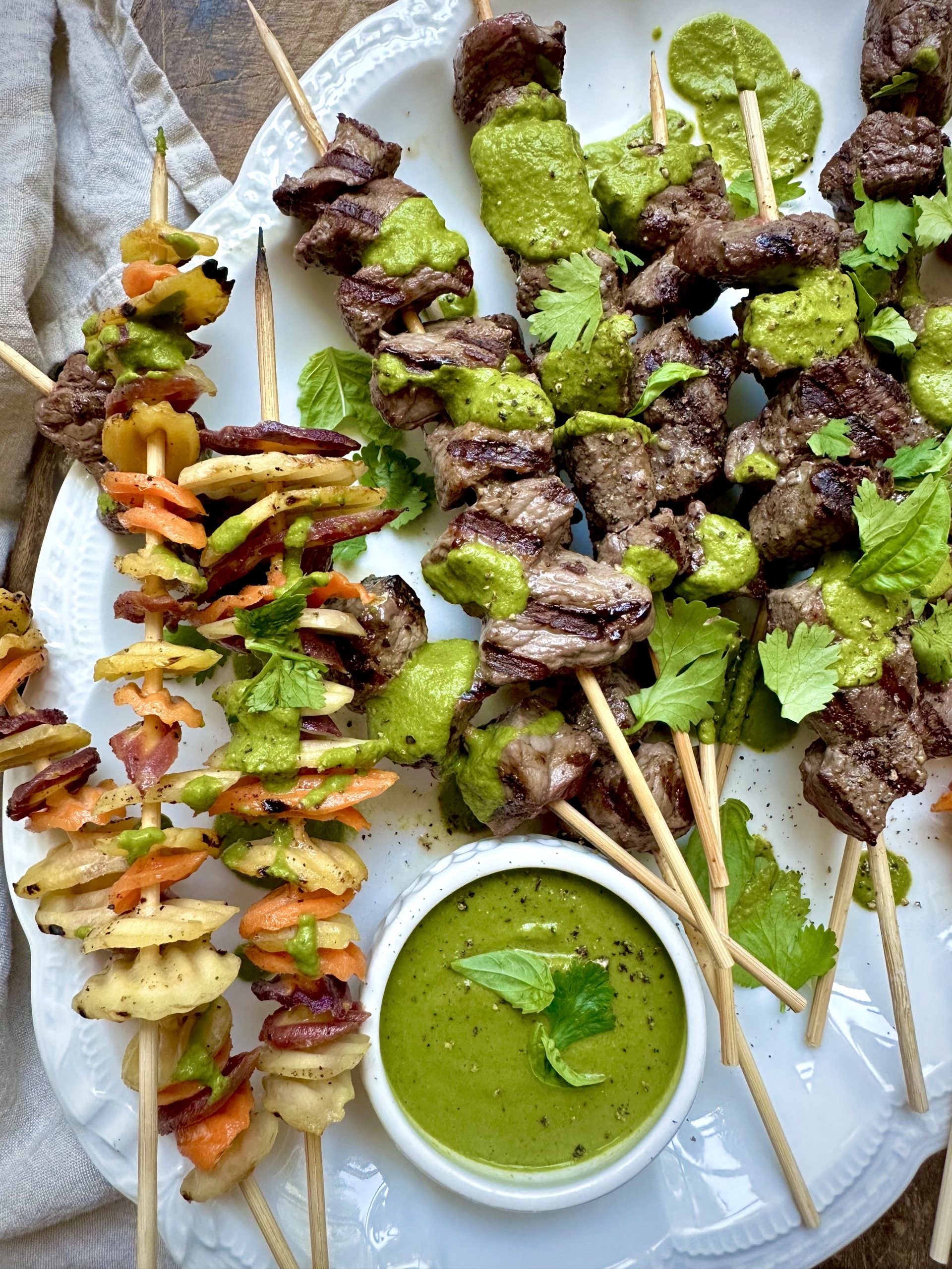 Grilled Steak & Rainbow Carrot Kabobs with Spicy Green Sauce - Grimmway Farms